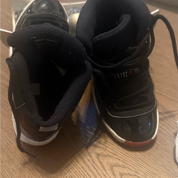 Kids Black and Red Jordan Retro Sneakers - Picture 2 of 8